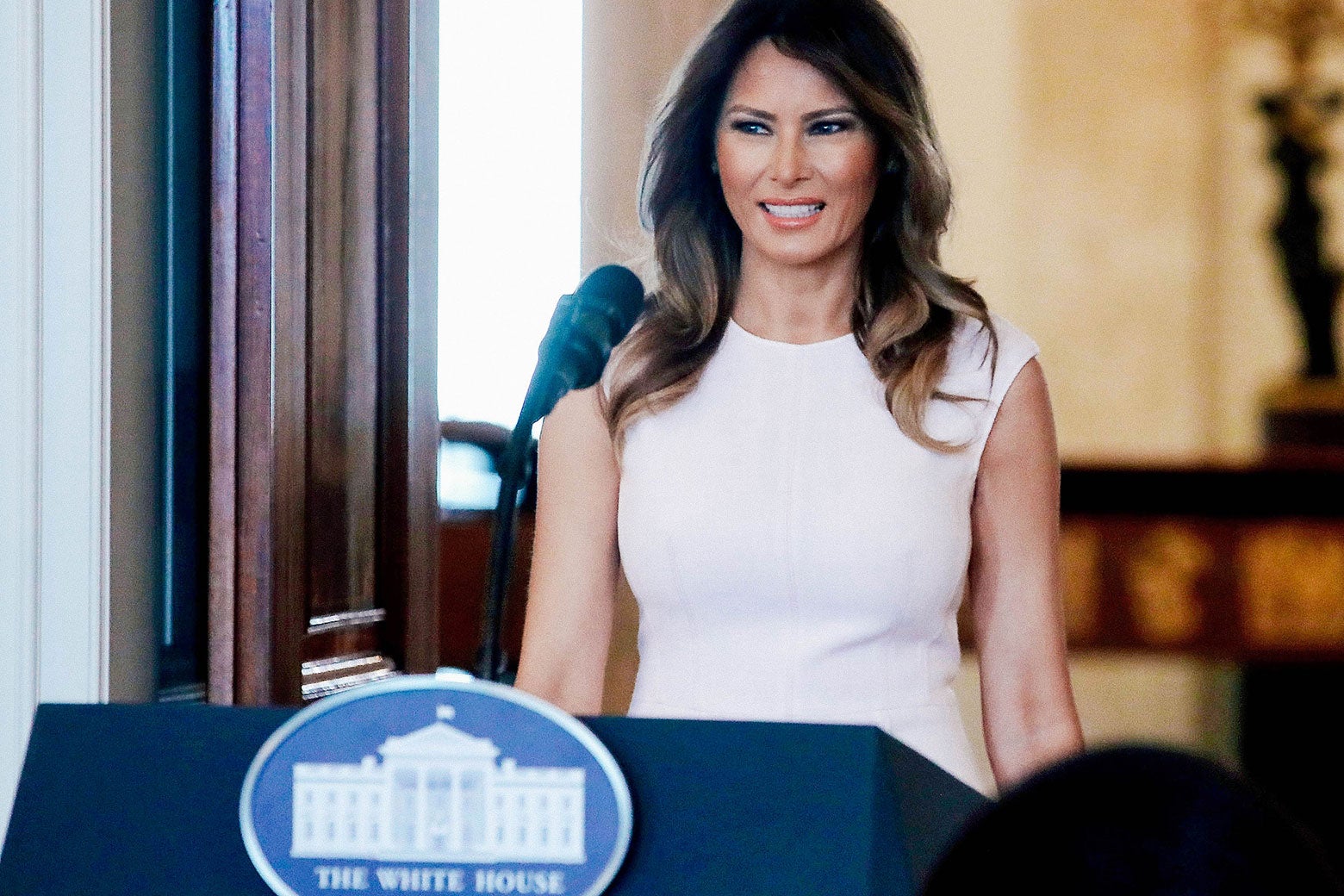 First lady Melania Trump walks into the Blue Room to speak at a luncheon for governors’ spouses at the White House on Feb. 26 in Washington.
