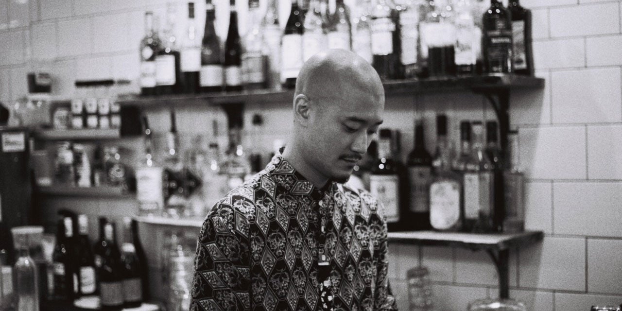 Bartender having a pensive moment.
