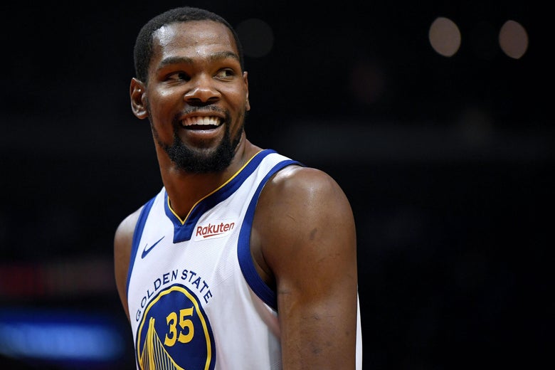 LOS ANGELES, CALIFORNIA - APRIL 26:  Kevin Durant #35 of the Golden State Warriors smiles at his bench in a 129-110 win over the LA Clippers during Game Six of Round One of the 2019 NBA Playoffs at Staples Center on April 26, 2019 in Los Angeles, California. (Photo by Harry How/Getty Images)  NOTE TO USER: User expressly acknowledges and agrees that, by downloading and or using this photograph, User is consenting to the terms and conditions of the Getty Images License Agreement.