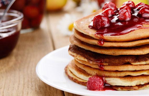 Delicious pancakes with raspberries.