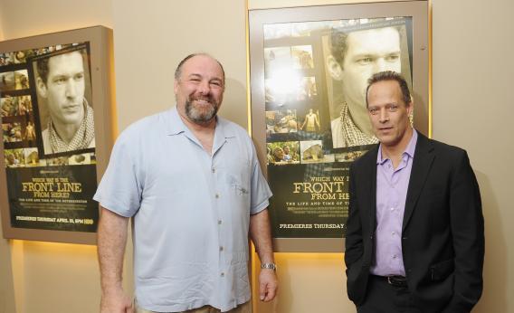 James Gandolfini and filmmaker/journalist Sebastian Junger attend the New York premiere of Which Way Is the Front Line From Here? at the HBO Theater on April 10, 2013, in New York City.