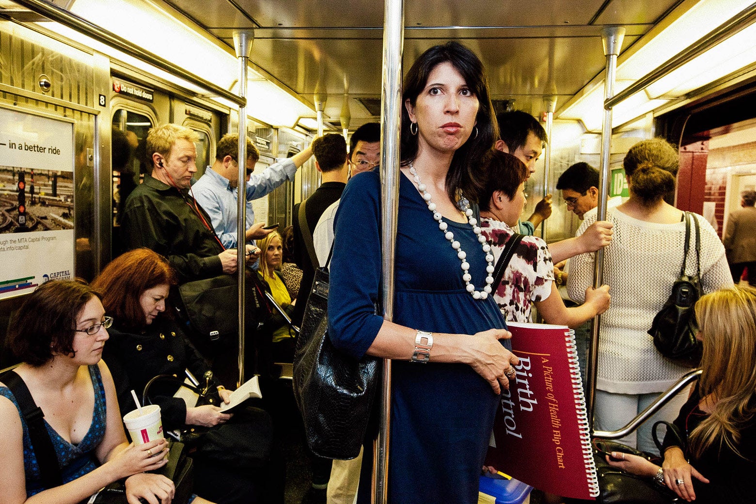 Amanda rides the subway.