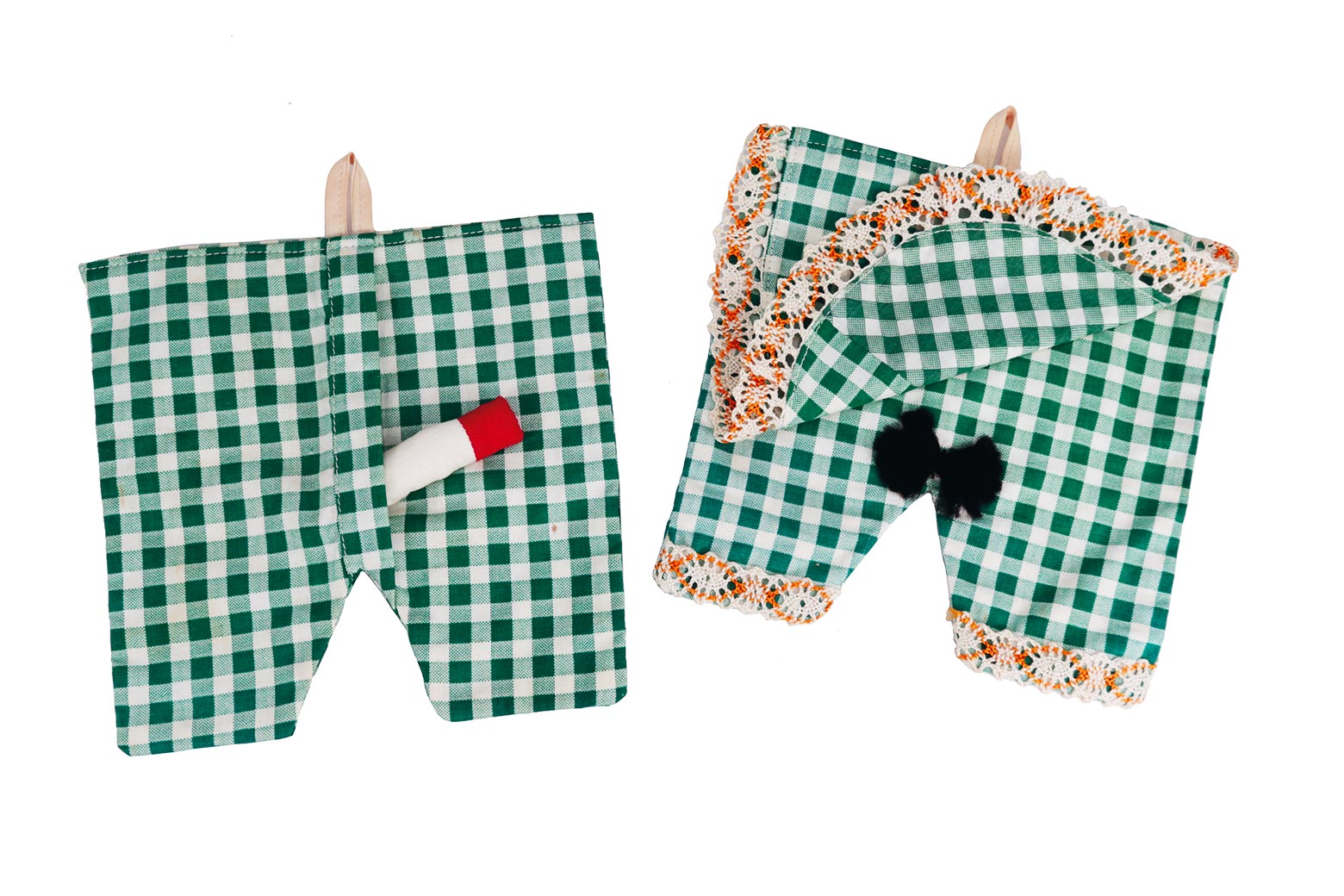 Gingham potholders with attached cloth penises and thatches of pubic hair.
