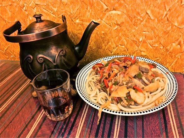 Bland lamian noodles with fatty meet, peppers, onions, and thinly sliced potatoes at the (real) Uyghur Restaurant in Nasr City, Cairo.