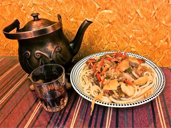 Bland lamian noodles with fatty meet, peppers, onions, and thinly sliced potatoes at the (real) Uyghur Restaurant in Nasr City, Cairo. 