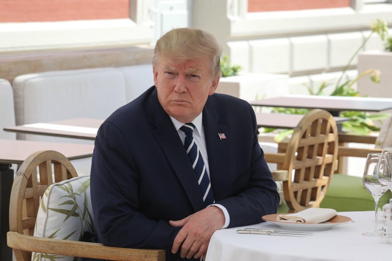 President Donald Trump sits to lunch at the Hotel du Palais in Biarritz, south-west France on August 24, 2019, on the first day of the annual G7 Summit attended by the leaders of the world's seven richest democracies, Britain, Canada, France, Germany, Italy, Japan and the United States. 