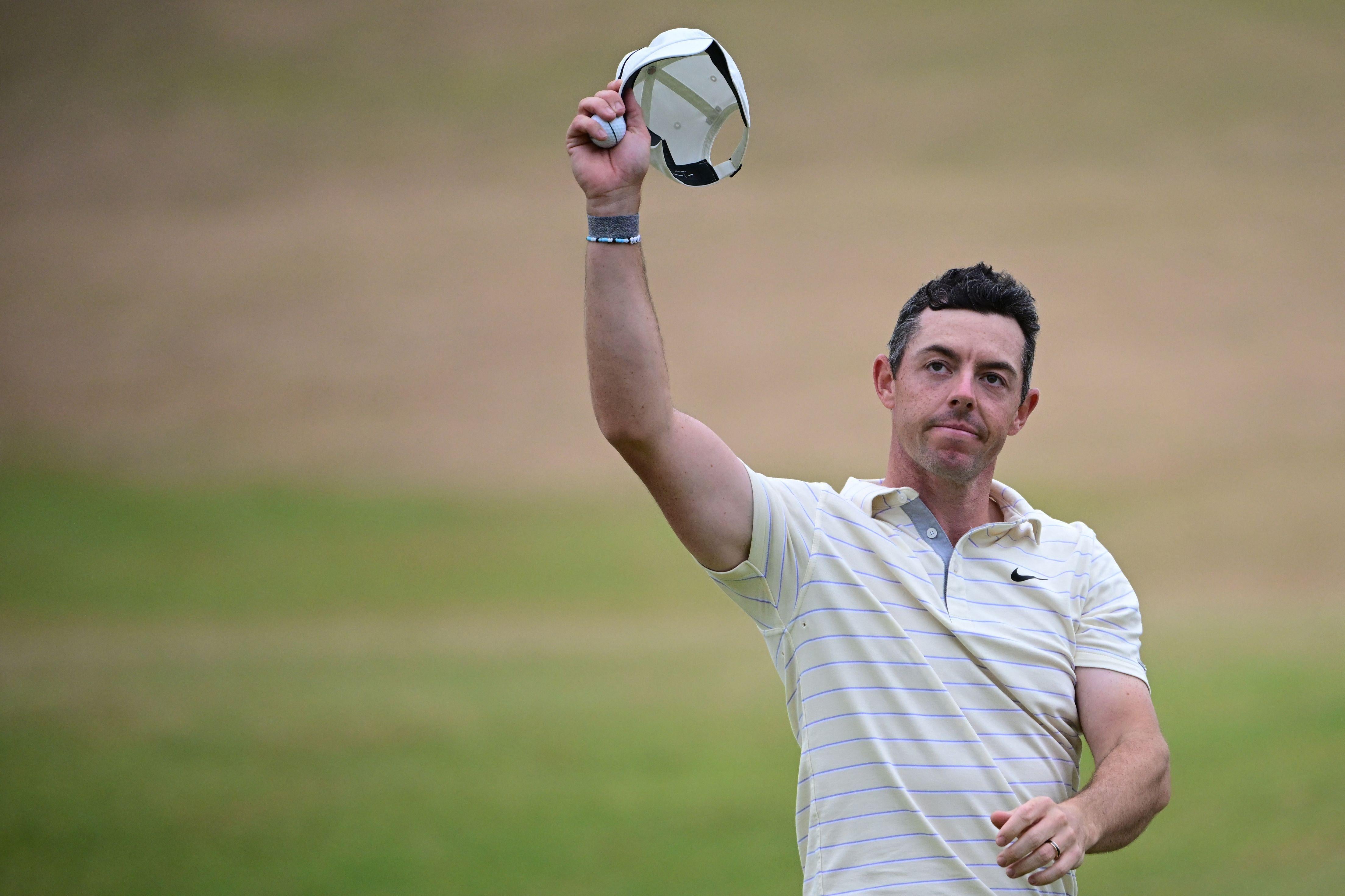 Rory McIlroy tips his cap.