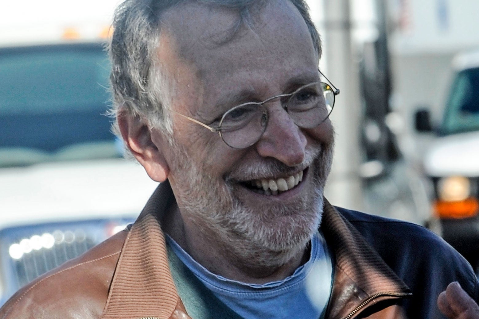 A smiling late-middle-aged white man in casual clothes.