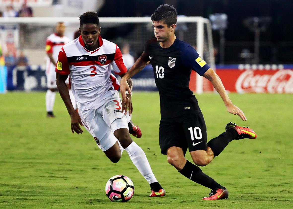 Christian Pulisic #10 of the United States drives past Joevin Jones #3 of Trinidad & Tobago during the FIFA 2018 World Cup Qualifier at EverBank Field on September 6, 2016 in Jacksonville, Florida. 