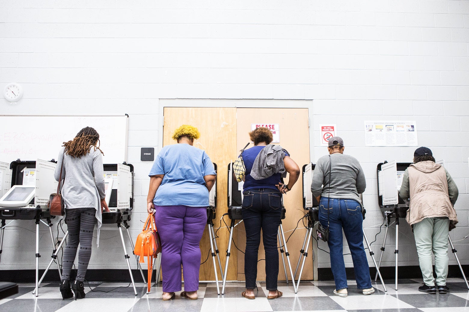 Voters cast ballots during the early voting period at C.T. Martin Natatorium and Recreation Center on October 18, 2018 in Atlanta, Georgia. Early voting started in Georgia on October 15th. 