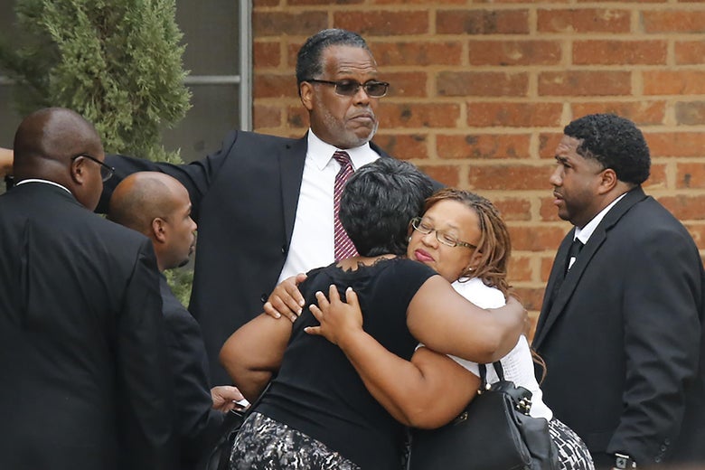 People attending the funeral of Botham Jean