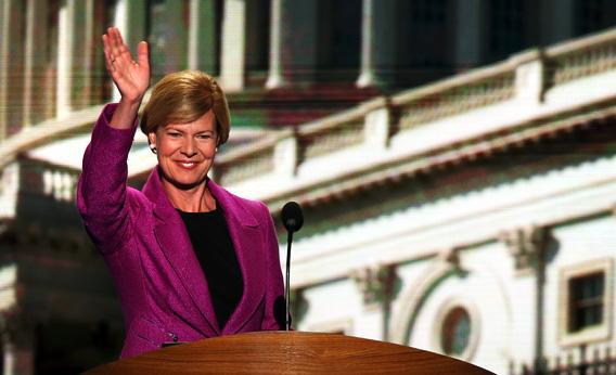 U.S. Rep. Tammy Baldwin (D-WI) waves on stage during the final day of the Democratic National Convention.