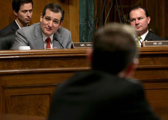 Senate Judiciary Committee members Sen. Ted Cruz (R-TX) (2nd L) and Sen. Mike Lee (R-UT) (R) question David Barron during his nomination hearing November 20, 2013 in Washington, DC. 