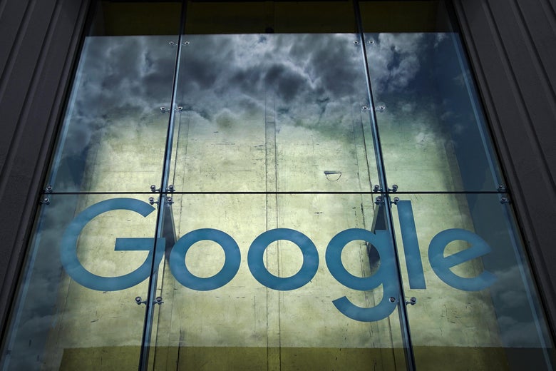 The Google logo on the glass surface of the Google office building in New York