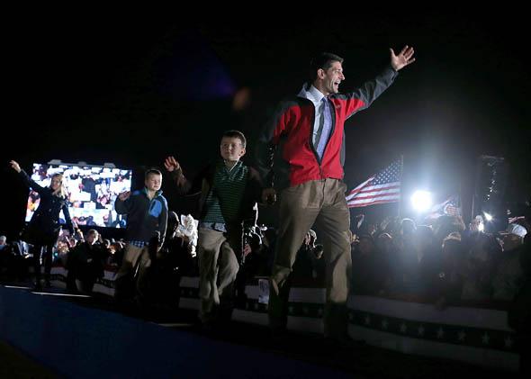 Rep. Paul Ryan (R-WI) waves to supporters during a campaign rally at Hoover High School on October 26, 2012 in Akron, Ohio. 
