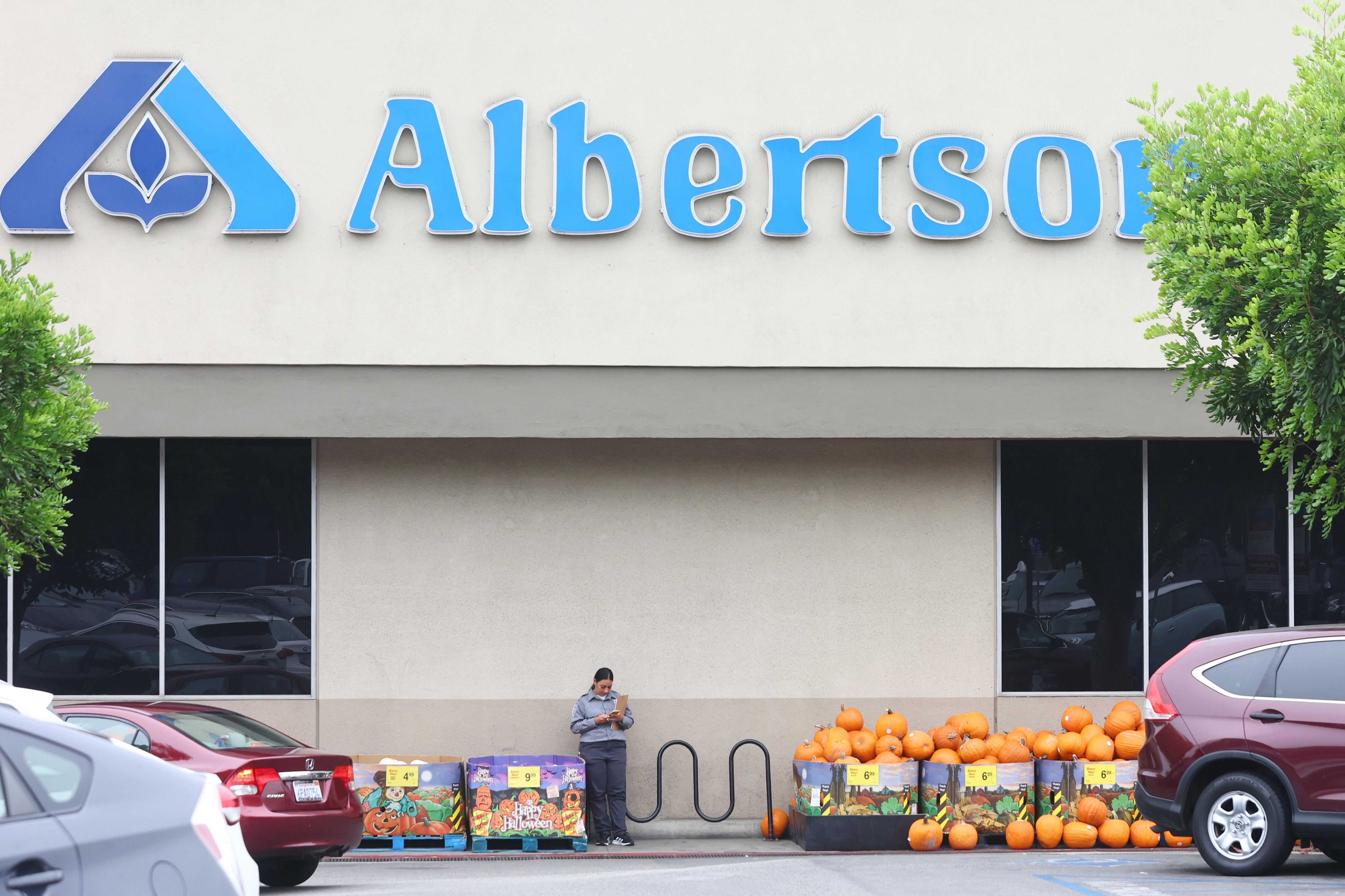 LOS ANGELES, CALIFORNIA - OCTOBER 14: The Albertsons logo is displayed in front of an Albertsons grocery store on October 14, 2022 in Los Angeles, California. Top grocery retailer Kroger has agreed to acquire rival Albertsons for $24.6 billion. (Photo by Mario Tama/Getty Images)