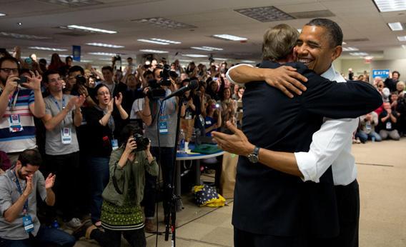 Pres. Obama bear hugs his campaign manager Jim Messina at campaign headquarters in Chicago. 