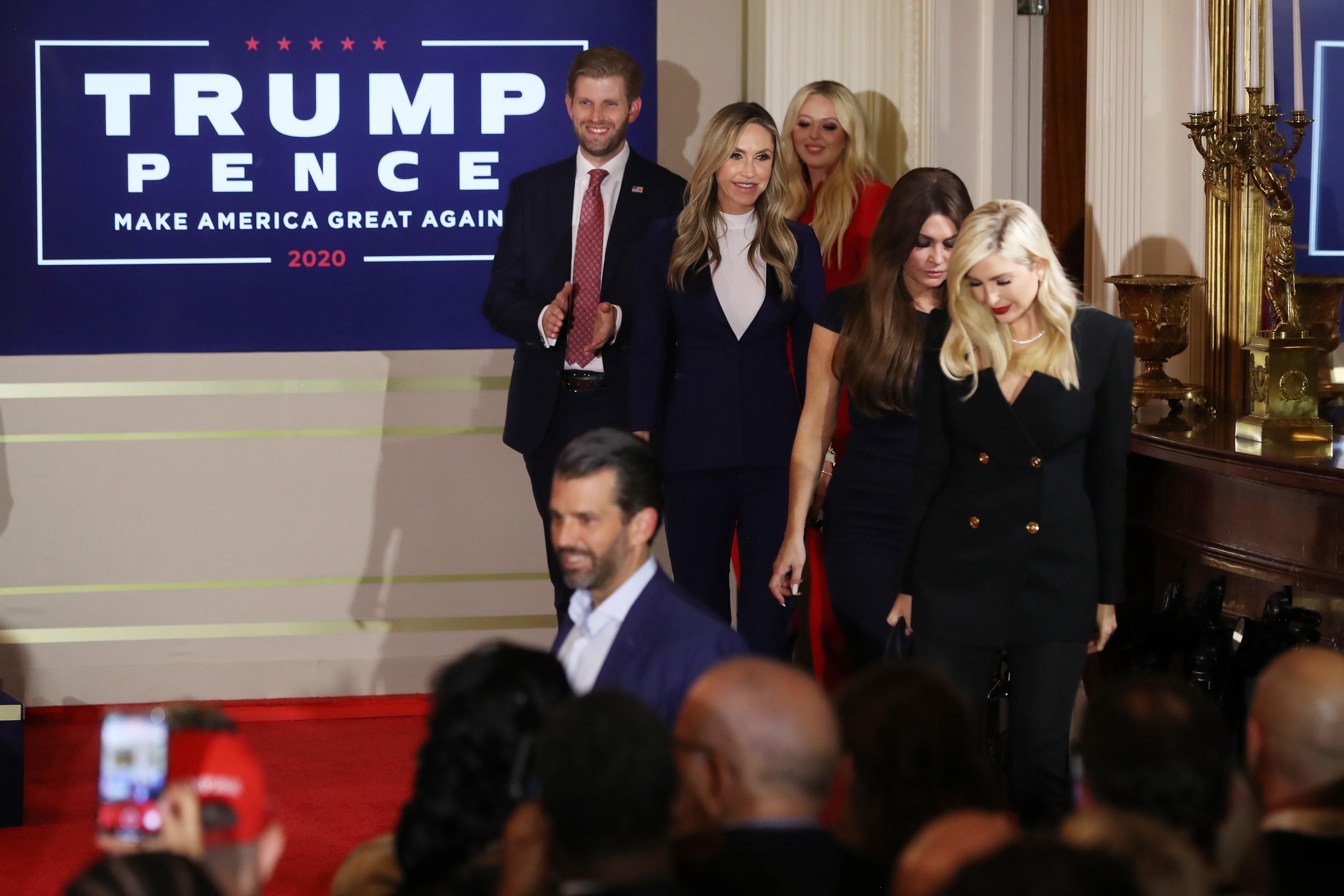 Donald Trump Jr., Ivanka Trump, Kimberly Guilfoyle, Lara Trump, Eric Trump, and Tiffany Trump appear on election night in the East Room of the White House in the early morning hours of November 04, 2020 in Washington, DC.