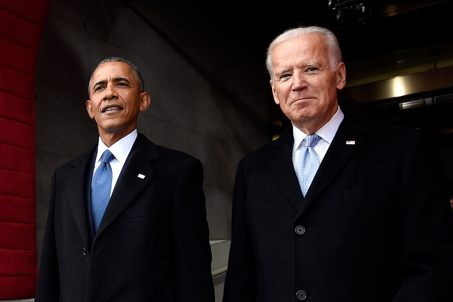Barack Obama and Joe Biden stand side by side.