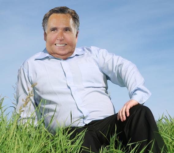 Photo illustration of Mitt Romney as an obese man.