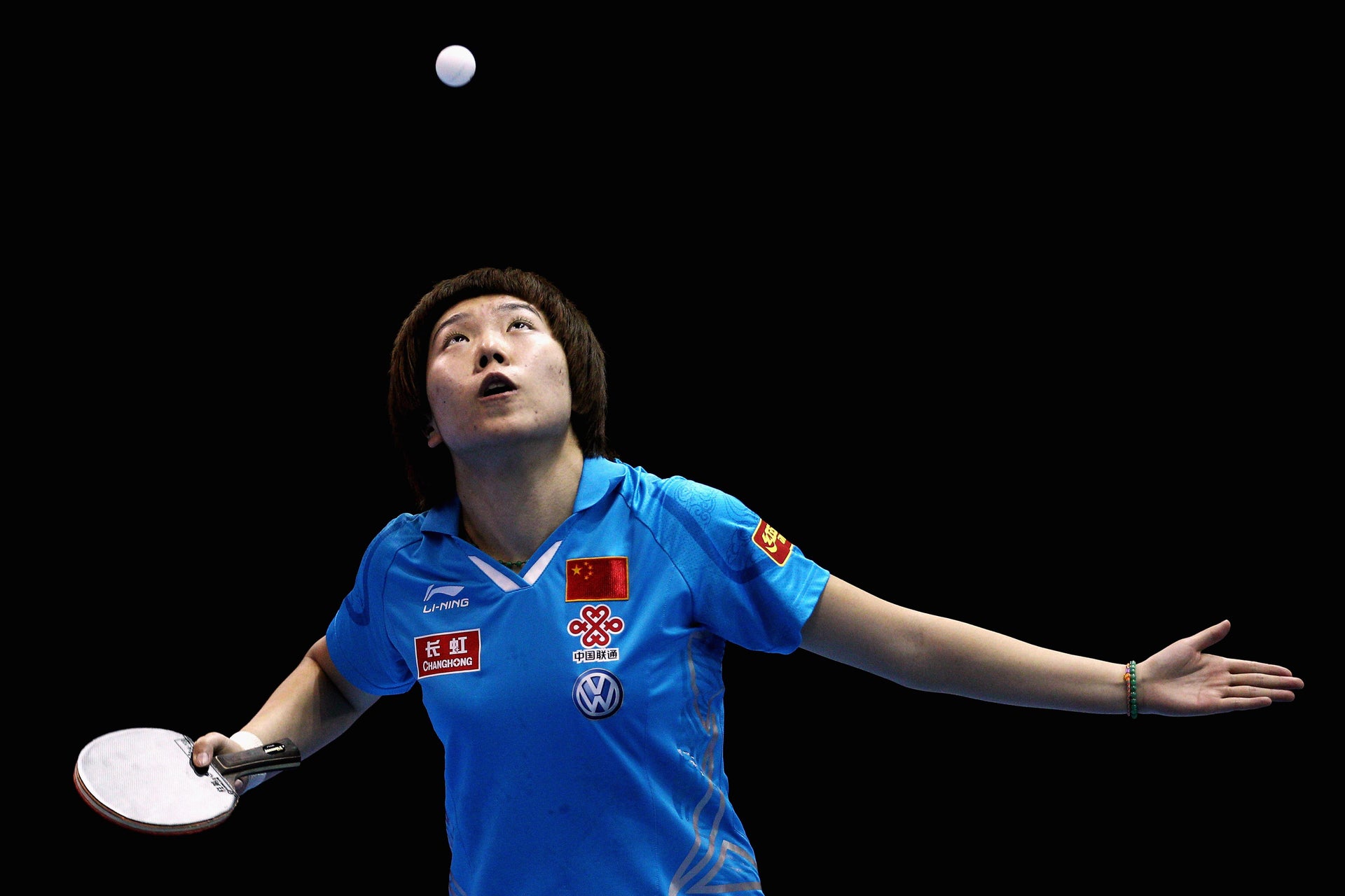 Ariel Hsing Why do Olympic table tennis players toss the ball so high when they serve?