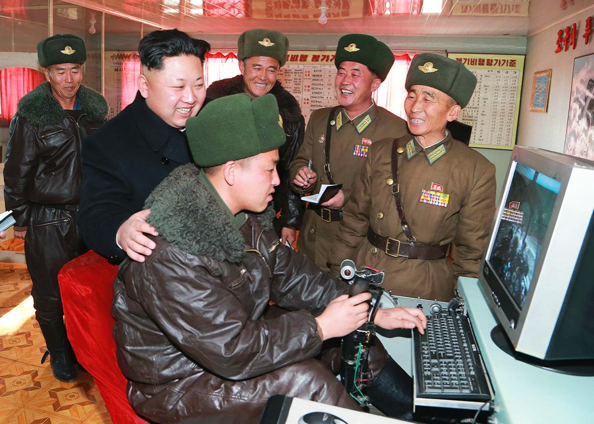 North Korean leader Kim Jong Un smiles as he inspects the KPA Air and Anti-Air Force Unit 99. 