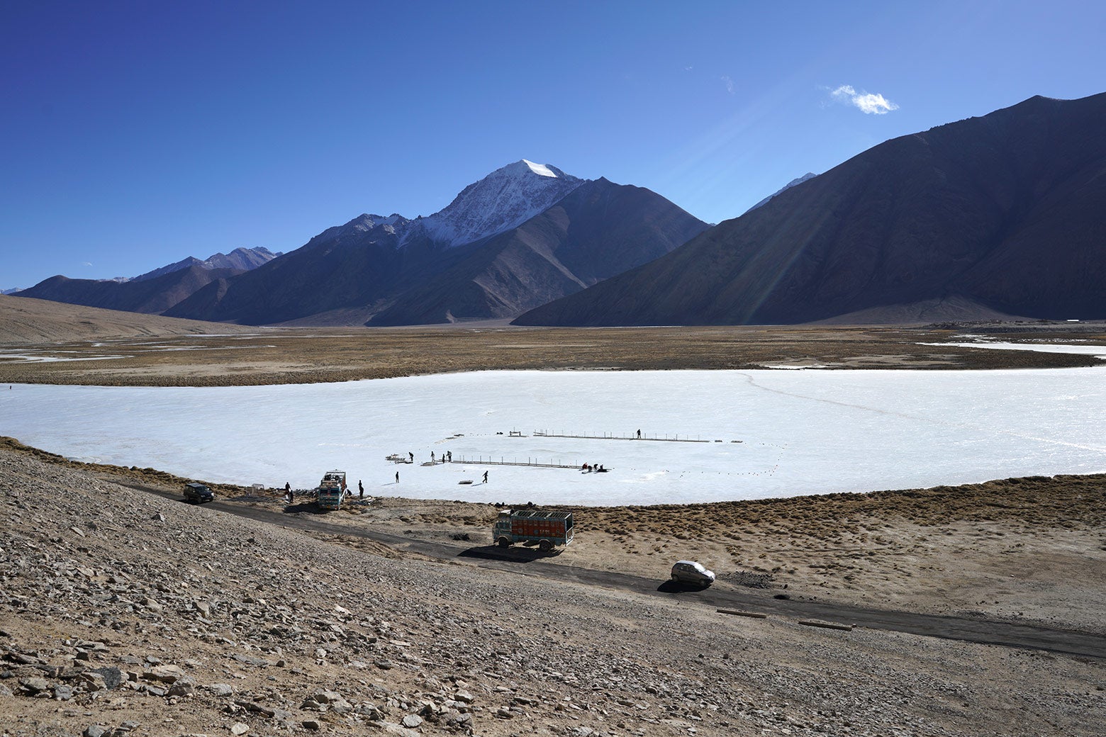 A hockey rink being built on the frozen flood plain in Chibra Kargyam.