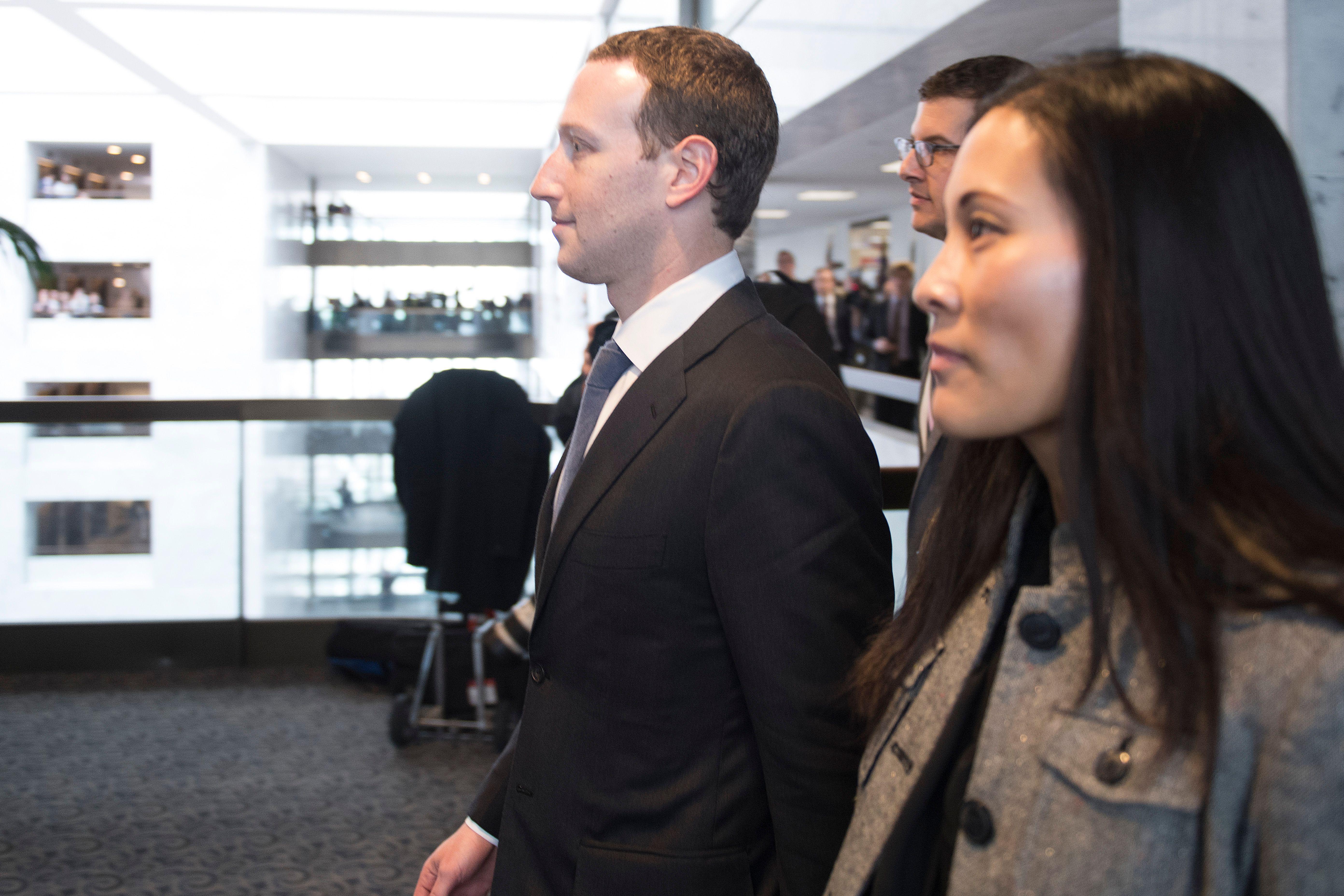 Mark Zuckerberg and Priscilla Chan (R) depart US Senator Bill Nelson's, D- Florida, office on Capitol Hill in Washington, DC, on April 9, 2018.Embattled Facebook chief Mark Zuckerberg has placed the blame for security lapses at the world's largest social network squarely on himself as he girded Monday for appearances this week before angry lawmakers.In prepared remarks released by a congressional panel, Zuckerberg admitted he was too idealistic and failed to grasp how the platform -- used by two billion people -- could be abused and manipulated. 