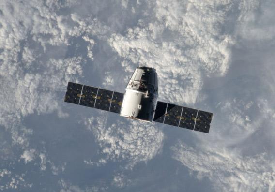 Dragon capsule in space in 2012