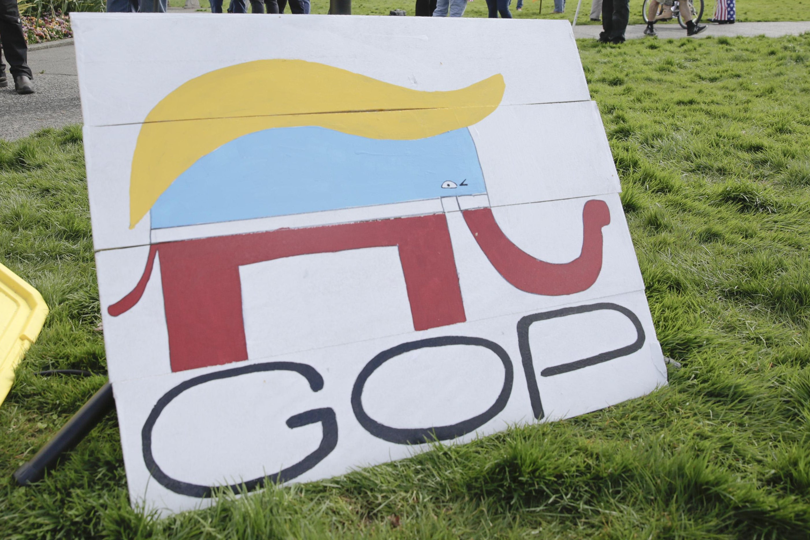 A Republican Party elephant logo is pictured with the hair of Donald Trump during a demonstration against Washington state's stay-home order at the state capitol in Olympia, Washington, on April 19, 2020. 