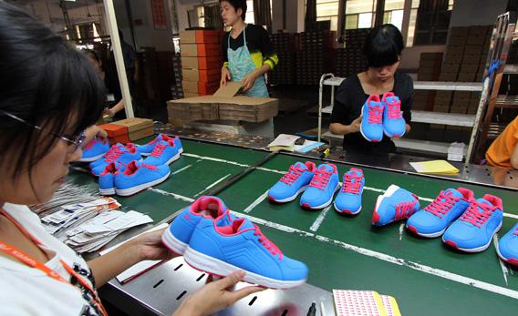 Chinese workers making shoes at a factory