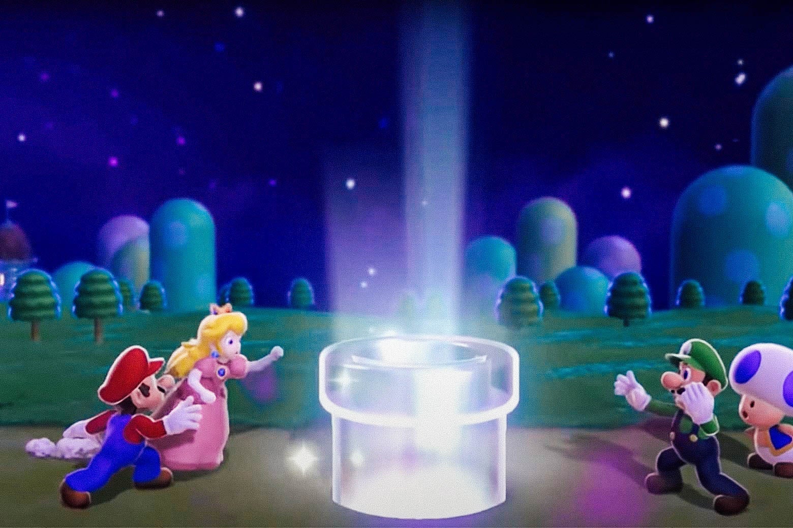 Mario, Peach, Luigi, and Toad stand around a hologram pipe.