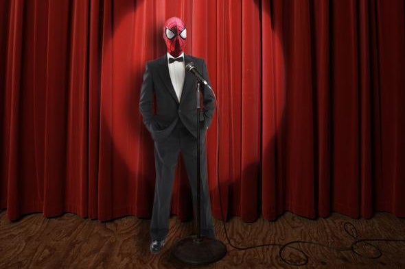 Spiderman on a stage in a tux