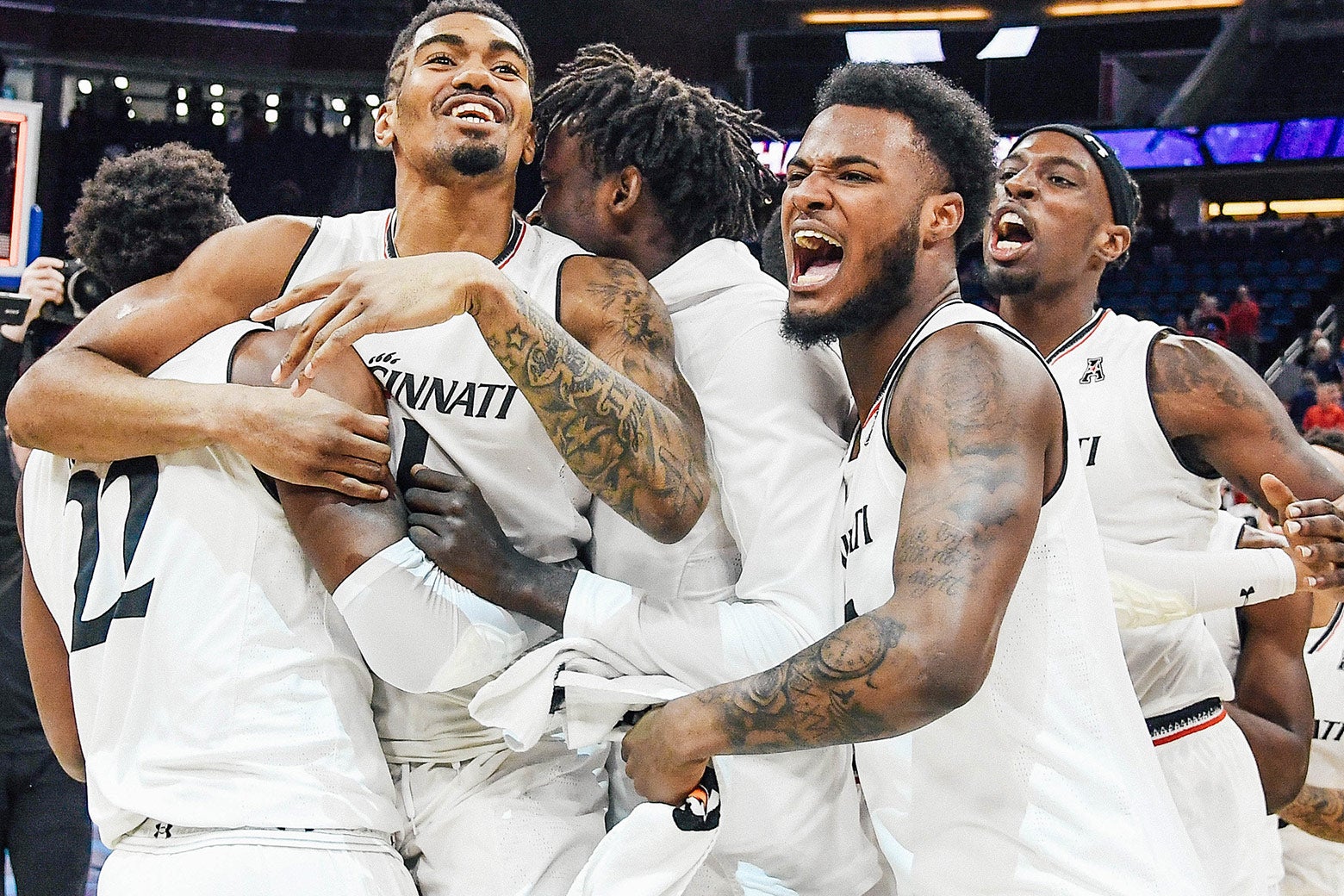 The Cincinnati Bearcats celebrate their championship after the final game of the 2018 AAC Basketball Championship against the Houston Cougars at Amway Center on Sunday in Orlando, Florida.