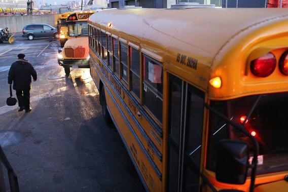 School buses and drivers at the Atlantic Express Transportation Corp. in Queens head back to work after the drivers and matrons suspended their January 16th strike on February 20, 2013 in New York City.