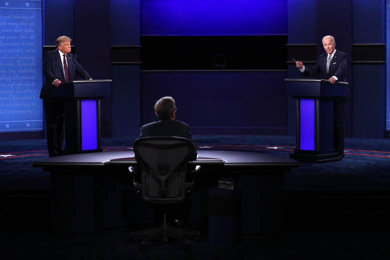 CLEVELAND, OHIO - SEPTEMBER 29:  U.S. President Donald Trump and Democratic presidential nominee Joe Biden participate in the first presidential debate moderated by Fox News anchor Chris Wallace (C) at the Health Education Campus of Case Western Reserve University on September 29, 2020 in Cleveland, Ohio. This is the first of three planned debates between the two candidates in the lead up to the election on November 3.  (Photo by Scott Olson/Getty Images)