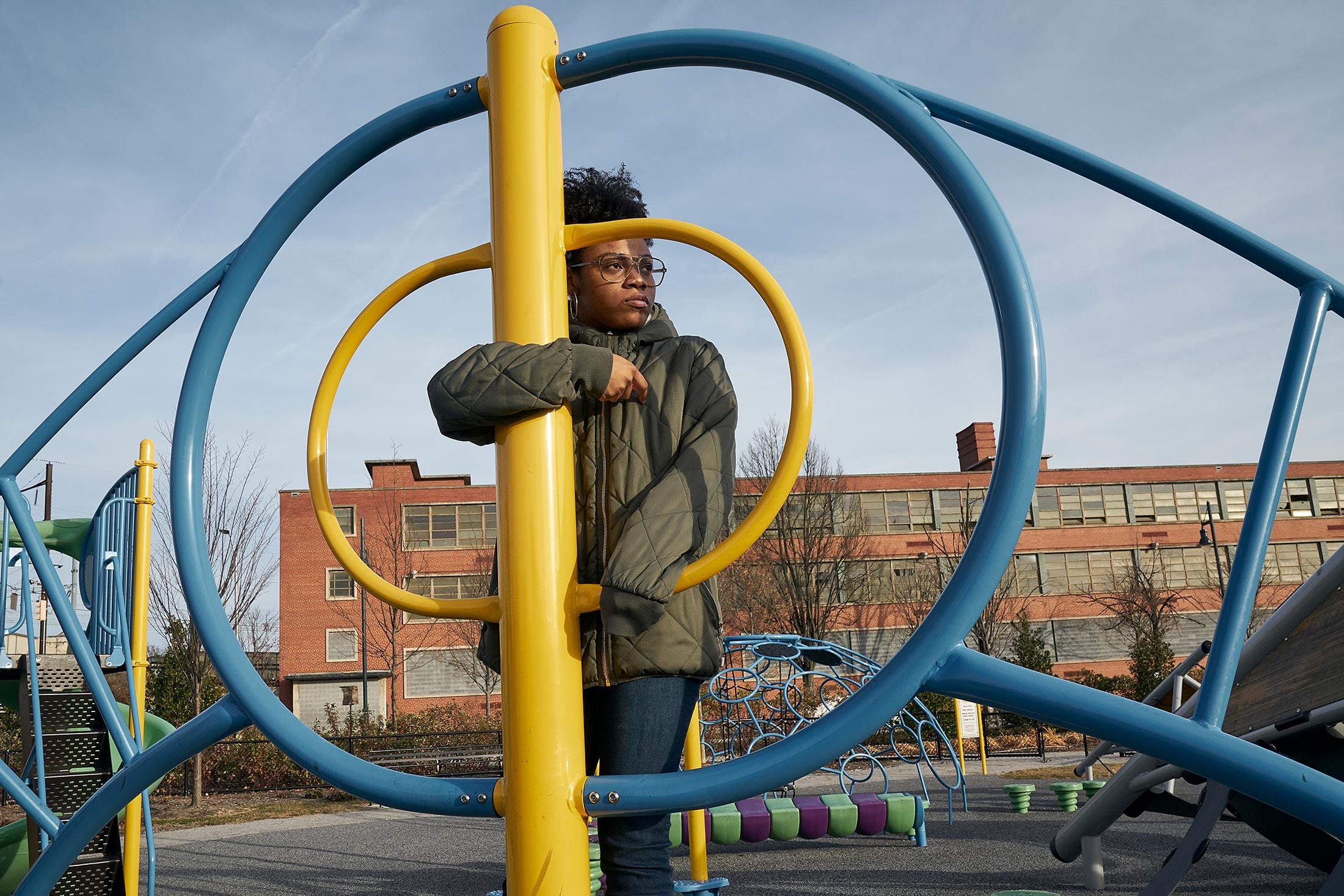 Charnita, standing in a playground, 12th grade.
