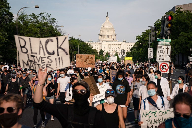 Many Black Lives Matter protesters, with the Capitol in the background
