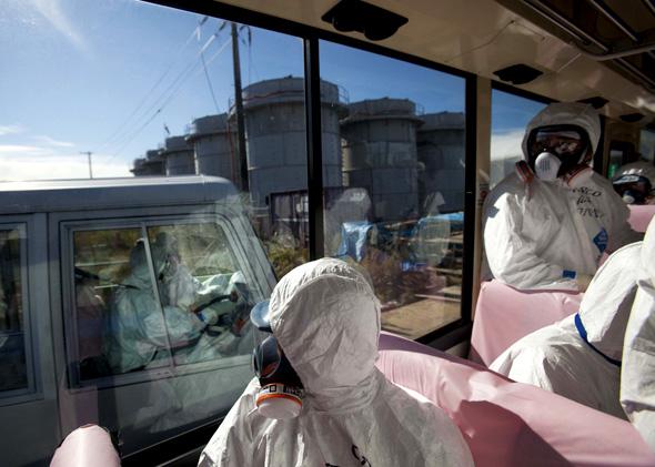 Buses tour the grounds of the Fukushima Daiichi nuclear power plant.