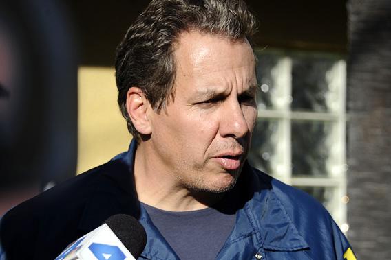 FBI agent Scott Garriola talks to the media about the investigation at the Archview apartment complex in Los Angeles, California.