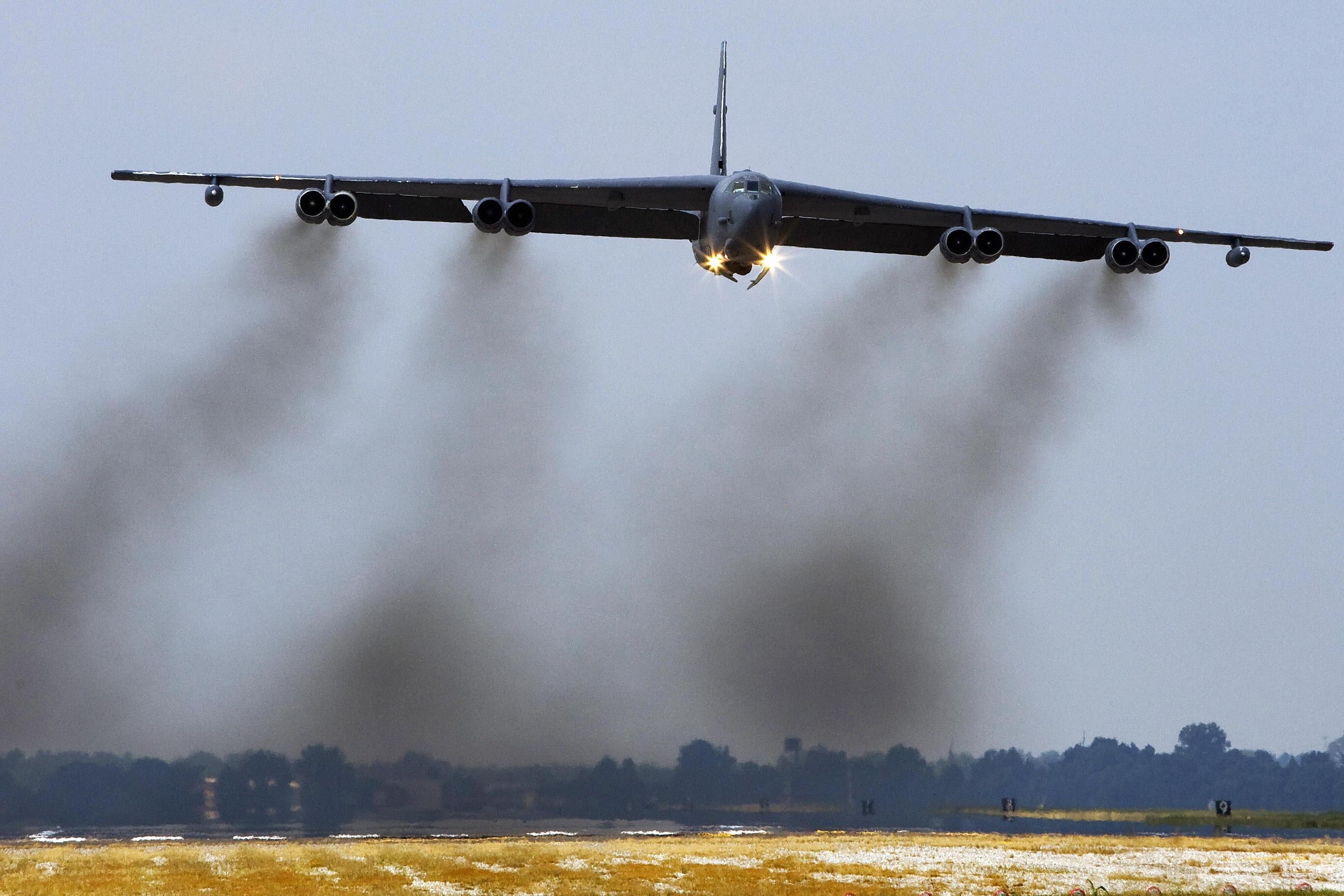 A B-52H long range bomber, part of the US Eight Air Force, 2nd Bomb Wing fleet, takes off 19 September 2007 from Barksdale Air Force Base in Louisiana.  The B-52H is the primary nuclear roled bomber in the USAF inventory. The bomber is capable of flying at high subsonic speeds at altitudes up to 50,000 feet (15,166.6 meters). It can carry nuclear or conventional ordnance with worldwide precision navigation capability.     AFP PHOTO/Paul J. Richards (Photo credit should read PAUL J. RICHARDS/AFP via Getty Images)