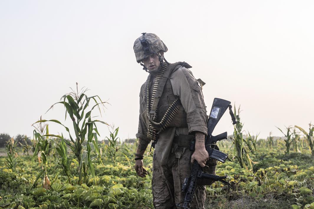 A Marine after a firefight with the Taliban.MIAN POSHTEH, HELMAND. AFGHANISTAN. 2009