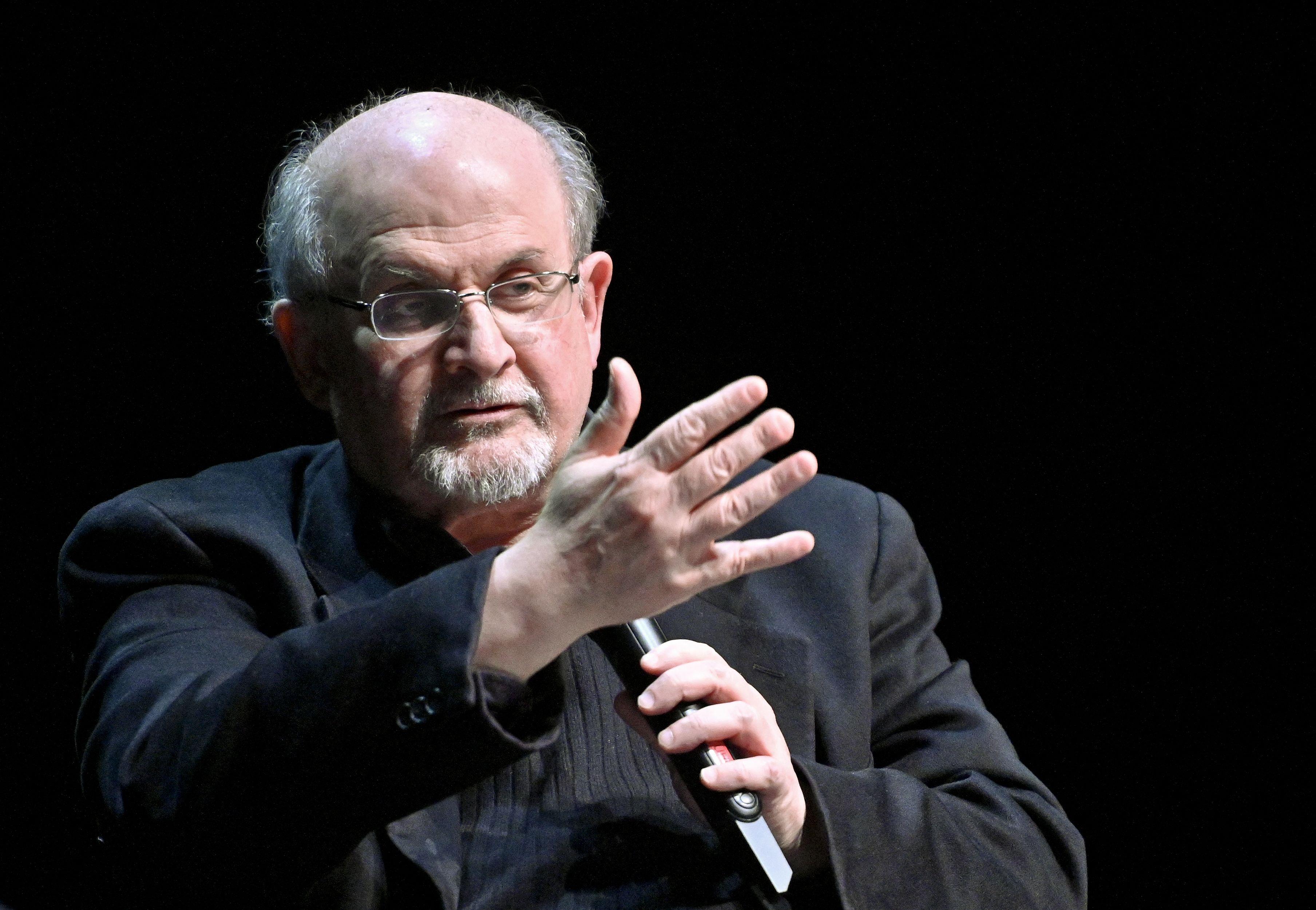 British author Salman Rushdie speaks as he presents his book "Quichotte" at the Volkstheater in Vienna, Austria, on November 16, 2019. - Austria OUT (Photo by HERBERT NEUBAUER / APA / AFP) / Austria OUT (Photo by HERBERT NEUBAUER/APA/AFP via Getty Images)