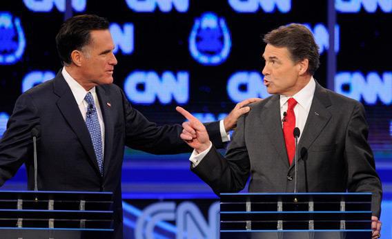 Former Massachusetts Gov. Mitt Romney and Texas Gov. Rick Perry at Tuesday's Republican presidential debate.