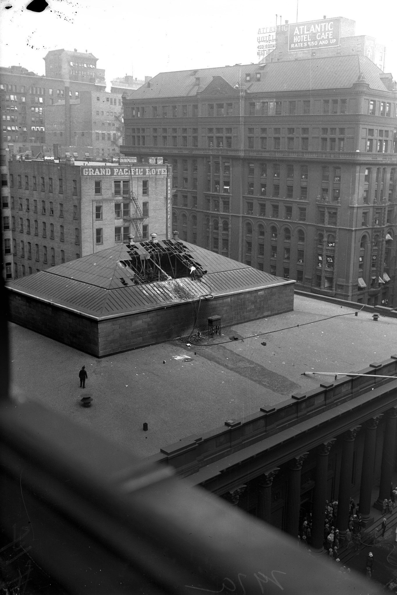 The roof of the bank after the crash, showing a blimp-sized hole in the skylight.