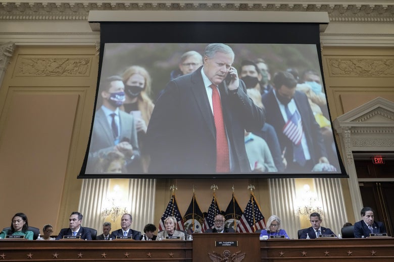 Mark Meadows displayed on a screen above the dais where members of the select committee sit.