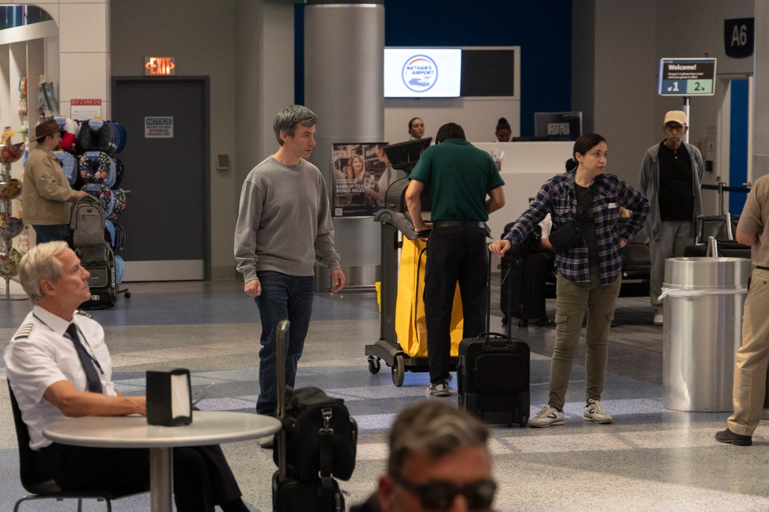 A still from The Rehearsal, taken in an airport waiting area.