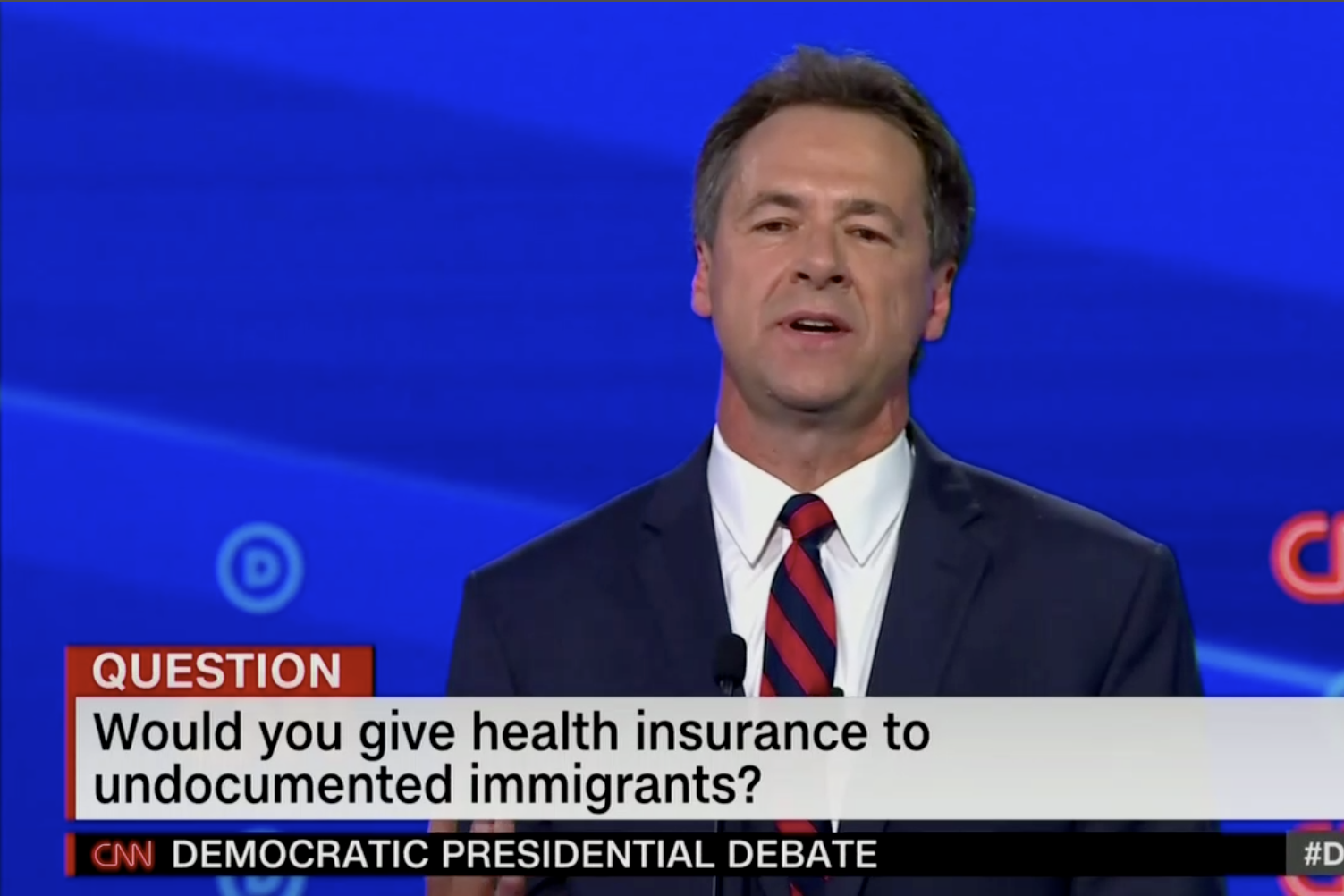 In this screengrab from CNN, "Would you give health insurance to undocumented immigrants?"