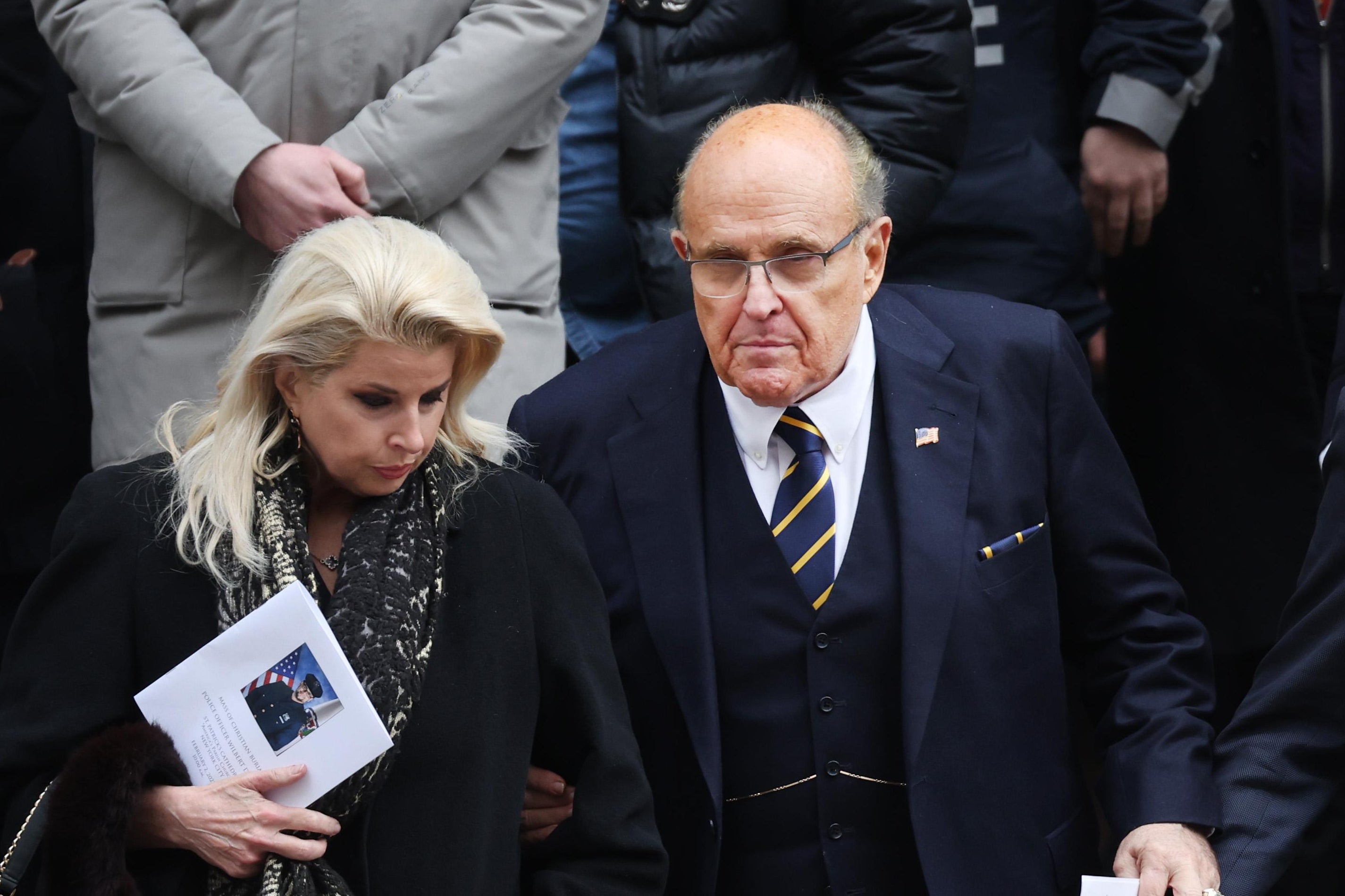 Former New York City Mayor Rudy Giuliani leaves the funeral for fallen NYPD officer Wilbert Mora at St. Patrick's Cathedral on February 2, 2022 in New York City.