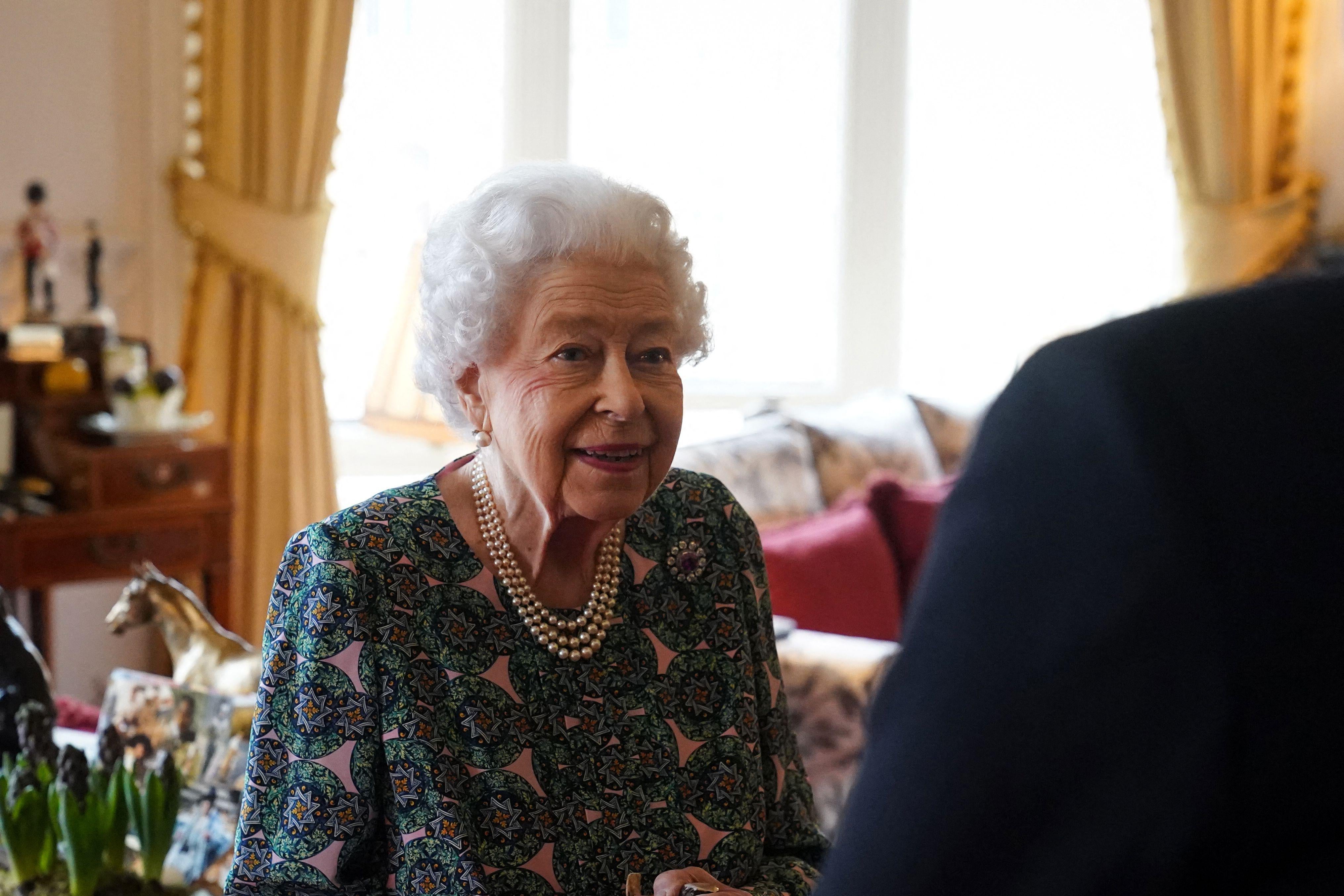 Britain's Queen Elizabeth II holds an in-person audience at the Windsor Castle, in Windsor, on February 16, 2022. 
